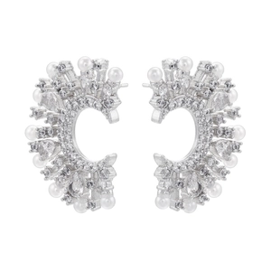 Detail view of silver C-shaped earrings with pearls and radiant pear-cut zircons
