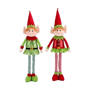 Detail of cute long-legged Christmas elf dolls with red and green sequins decor