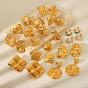 Collection of 18K gold plated hammered earrings with butterfly and heart geometric motifs