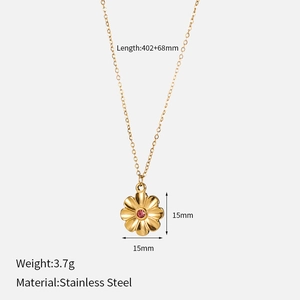 Detail of gold flower pendant necklace with red zircon center and 402+68mm chain