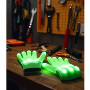 Detailed close-up of glowing green LED gloves laying on a rustic wooden workbench surface