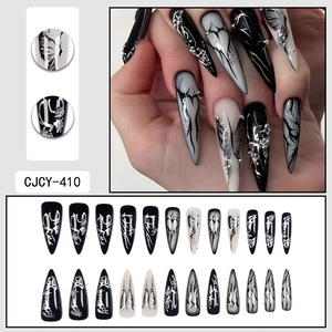 Dark punk gothic stiletto press-on nails with butterfly and silver chrome 3D heart design