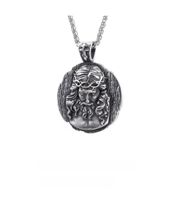 Detailed relief of Jesus Christ on a round stainless steel pendant measuring 54.8mm