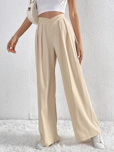 Women's high waist wide leg trousers in beige textured fabric with a pleated draped design