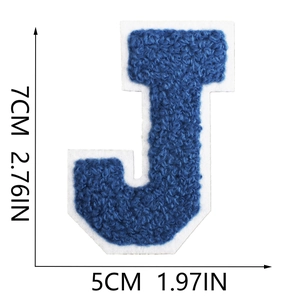 Detail of 7cm royal blue chenille letter J patch with white felt backing and size labels