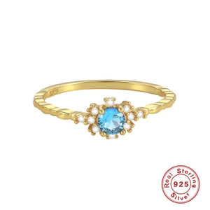 S925 sterling silver snowflake ring featuring blue zircon and textured wavy band