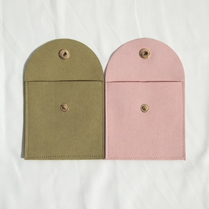 Microfiber jewelry pouch with arc snap closure in army green and pale pink suede