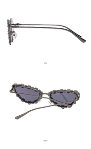 Side and back view of cat-eye sunglasses with rhinestone-encrusted metal frames