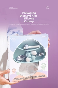 Close-up of mushroom-shaped kids silicone cutlery set in a minimalist gift box