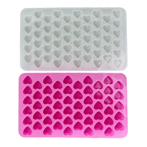 Detailed view of 55-cavity heart silicone molds in translucent white and pink colors