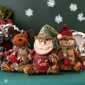 Christmas gift bags with snowman and reindeer designs and heart-shaped windows