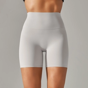 Detailed view of high-waisted grey yoga shorts showing soft matte texture and seamless fit