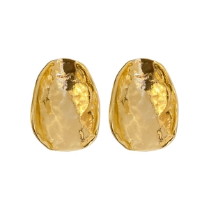 Irregular textured gold metal earrings with silver needle post in minimalist artistic style