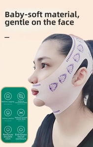 Detailed view of the pink elastic V-line lifting mask for jawline contouring and support