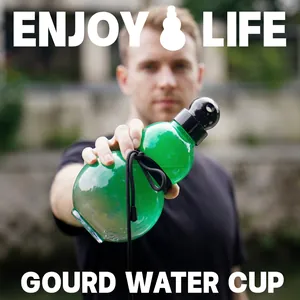 Green translucent gourd-shaped sports water bottle held by a model in outdoor setting