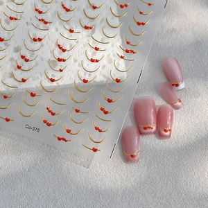 French style nail stickers Co-375 with gold curves and red hearts on light pink nails