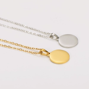 18k gold and silver stainless steel necklace with engraved round pendant in two colors