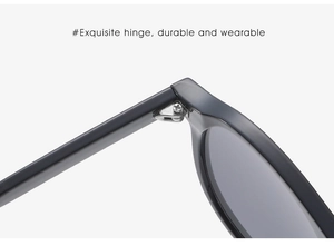 Detailed close-up of durable metal hinge and matte black frame on retro sunglasses