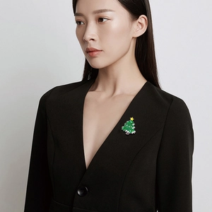 Cute green enamel Christmas tree brooch with colorful ornaments and yellow star on top