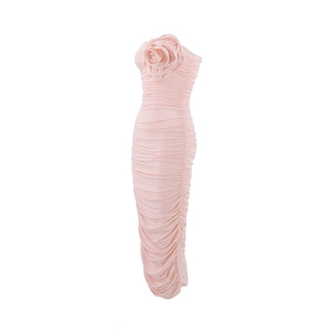 Detail of pink strapless bodycon dress with oversized 3D flower and pleated texture