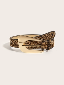 Close-up of leopard print belt for women with a gold horseshoe buckle detail