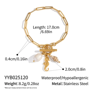 Detail view of 18K gold plated stainless steel ocean charm bracelet with size specifications