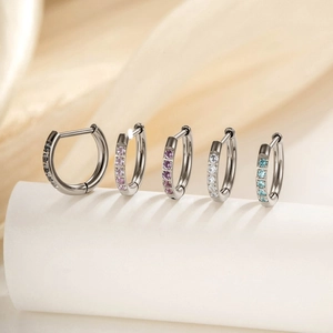 G23 titanium hoop earrings set with colorful zircon stones in a sleek minimalist style