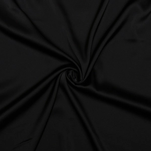 Detailed close-up showing the smooth, glossy texture and elegant drape of black satin fabric