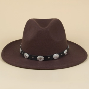 Detail of dark brown wool fedora featuring vintage silver studs and star patterns