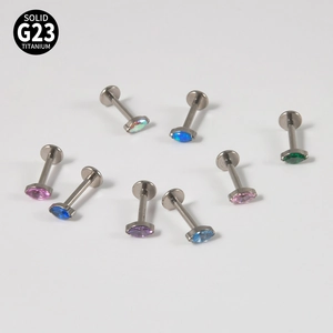 Detailed set of eight marquise G23 titanium flat back labret studs in diverse opal colors