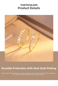 Detailed macro view of double-layered zircon heart rings with premium gold plating finish
