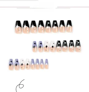 Detail view of 24pcs long coffin press-on nails with black and purple star patterns