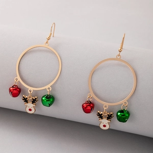 Close-up of gold hoop earrings with red and green bells and a white reindeer charm