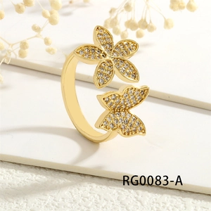Detail showing the 18K gold plated butterfly and flower open ring with micro-set zircon