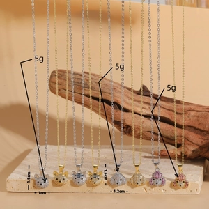 Cute puppy dog pendant necklace with colorful cubic zirconia and gold plated chain
