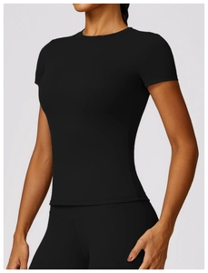 Close-up of slim fit black quick-dry sports t-shirt with crew neck and matte texture