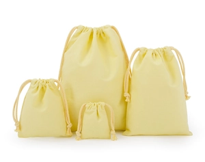 Detail showing four sizes of eco-friendly beige cotton drawstring storage bags