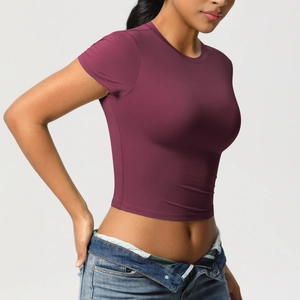 Close-up of burgundy high-elastic slim fit crop top T-shirt for yoga and gym workouts