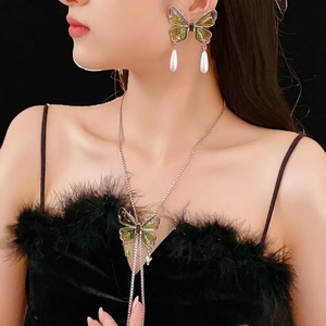 Sparkling butterfly tassel necklace and earrings set with green wings and pearl accents