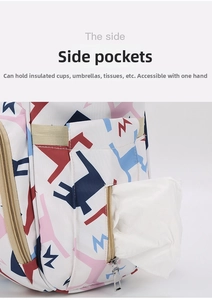 Detail view of printed diaper bag side pockets for tissues, water bottles and umbrellas