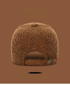 Detail of Lambswool Baseball Cap showing brown plush texture and metal adjustable buckle