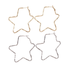 Minimalist cutout star hoop earrings in polished gold and silver finishes on white backdrop