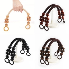 Detail of colorful wooden bead replacement straps for handbags with round clasps
