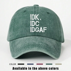 Adjustable washed cotton baseball cap with IDK IDC IDGAF embroidery in dark green