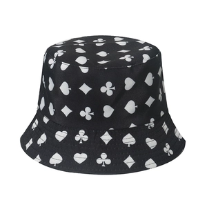 Retro black bucket hat featuring white poker suit patterns for street style fashion