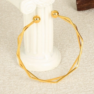 Luxurious 18K gold-plated stainless steel open cuff bracelet with wavy geometric design