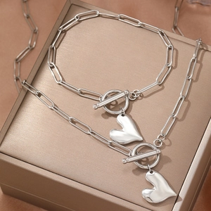 Polished silver heart pendant paperclip chain necklace and bracelet jewelry set with toggle clasp