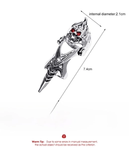 Detail view of gothic silver skeleton finger ring showing jointed alloy construction