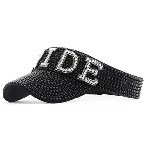 Black sun visor hat featuring pearl BRIDE lettering and studded pearl embellishments