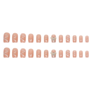 Set of 24 nude pink press-on nails with silver glitter waves and 3D bow charms
